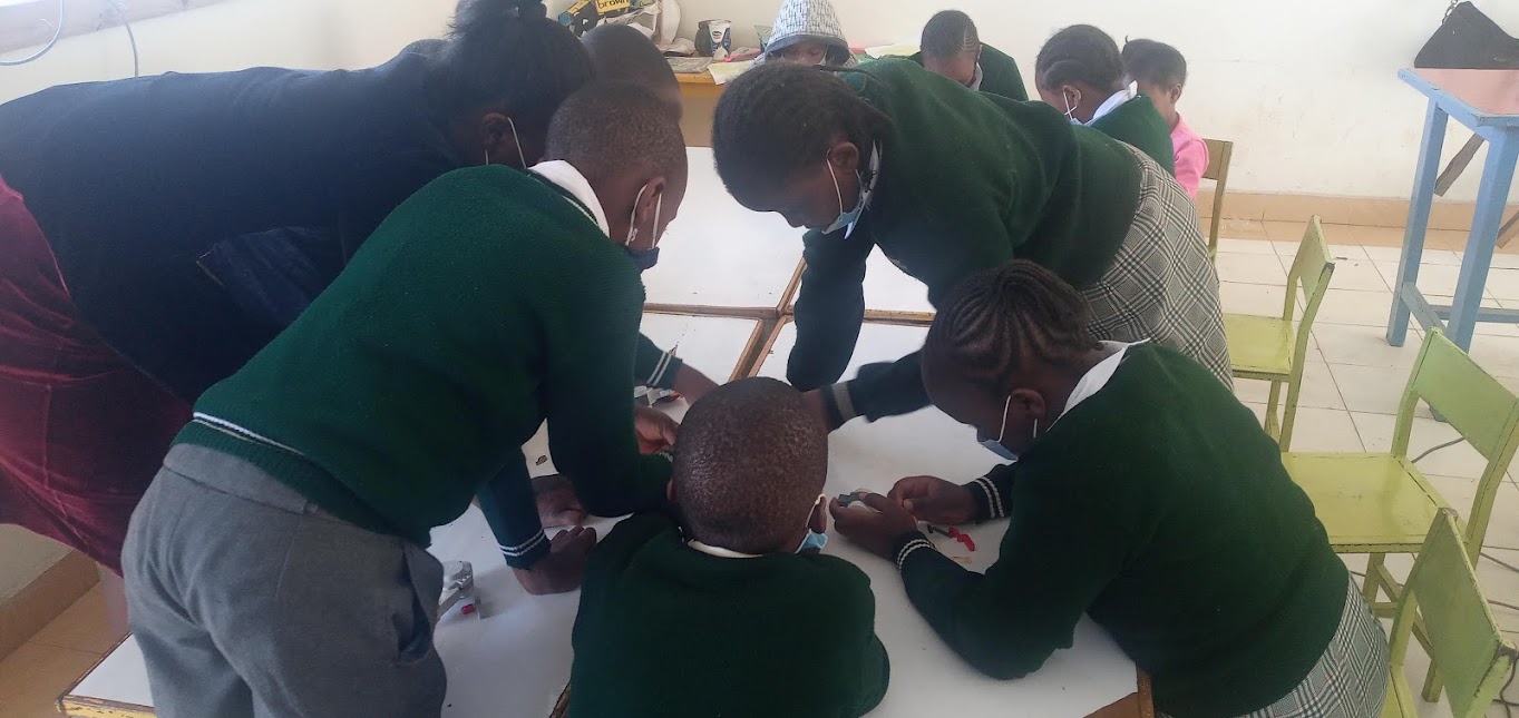 Children participating in a community learning session